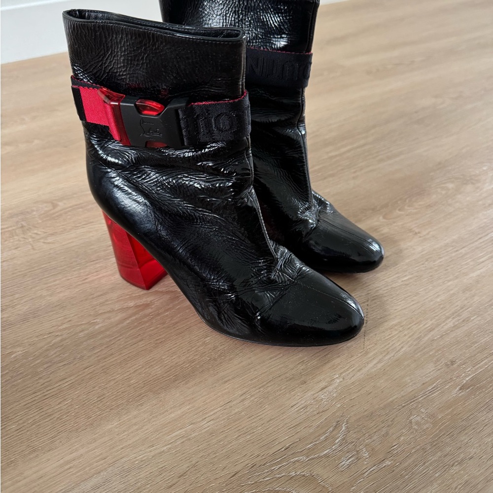 Christian Louboutin Black and Red Heels with Striking Design